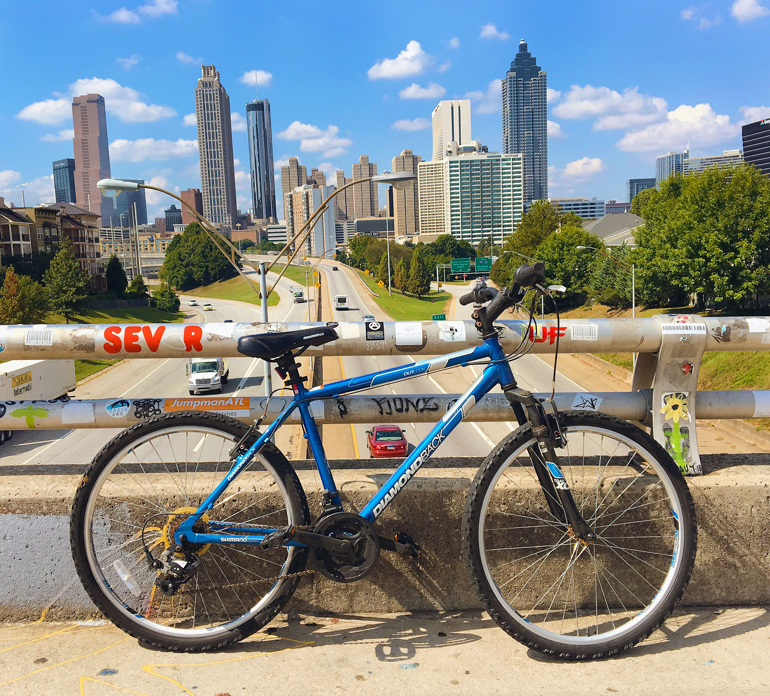 Image of a bike and the Atlanta city skyline.